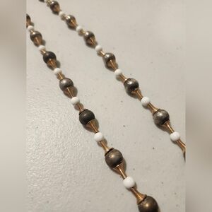 Elegant Gold and White Beaded Necklace